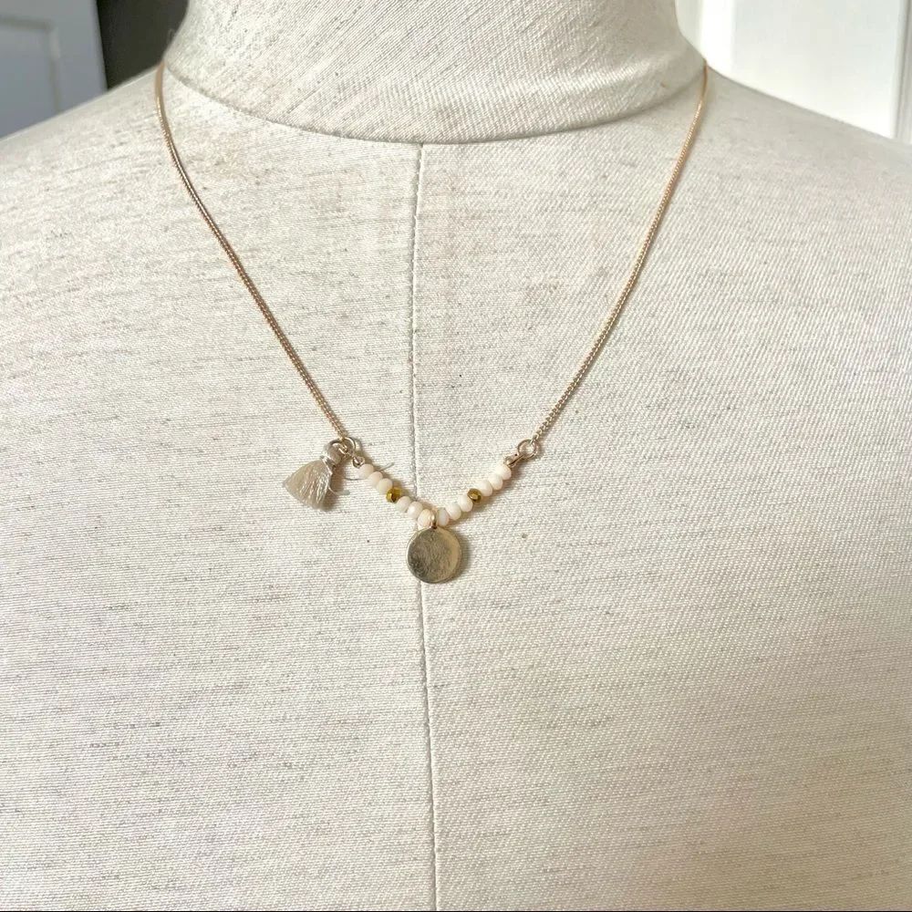 Dainty gold tone tassel charm necklace